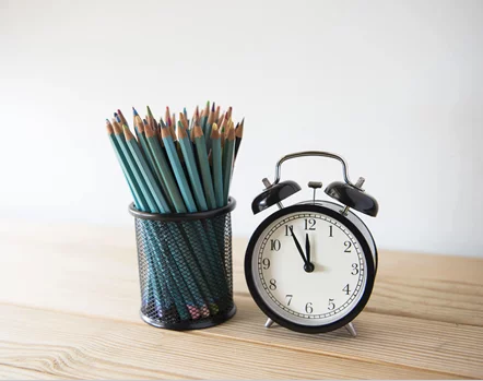 Pencils And Clock